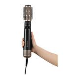 Remington Blow Dry & Style Caring AS7580 Hot Air Styler, held in the hand