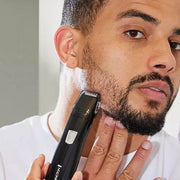 Remington PG180 Pilot 3-in-1 battery operated grooming kit with precision trimmer, foil shaver, and nose/ear heads.