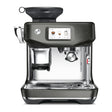 Sage Barista Touch Impress SES882BST4GUK1 Espresso Machine in 1049, front view with touchscreen and portafilter in place