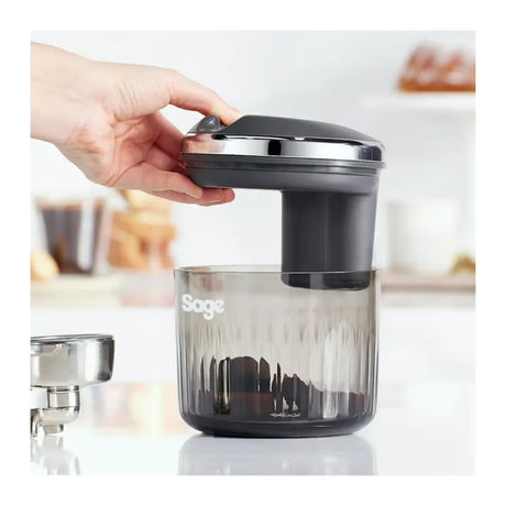 Sage Puck Sucker SEA503NEU0ZEU1 Espresso Puck Remover, lifting off the lid to empty the used pucks