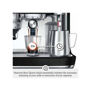 Sage The Oracle Jet automatic espresso machine in Black Truffle finish showing the touch screen and professional portafilter.