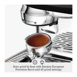 Sage Oracle Jet SES985BTR Espresso Machine in Black Truffle, close-up of the portafilter