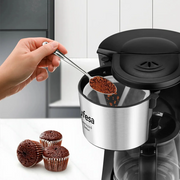 Ufesa CG7115 Capriccio 6 Delux coffee maker with a 0.6L glass carafe and premium stainless steel front decoration.