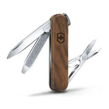Victorinox Classic SD Wood 0.6221.63 Pocket Knife with walnut scales, blade, nail file and scissors opened, front view