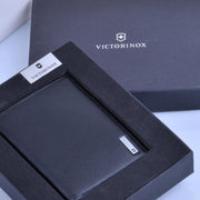Victorinox Grenoble vertical bi-fold wallet in black Napa leather showing high-capacity card slots and bill divider.