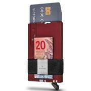Victorinox Smart Card Wallet shown in red, gray, and gold variants with integrated SwissCard tools and card sliding mechanism.