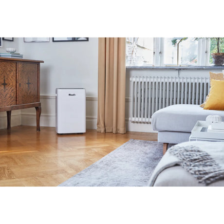 Wood's MRD20GW in White, in a living room beside a radiator and sofa