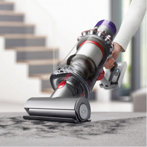 Dyson Cyclone V10 Absolute Cordless Vacuum Cleaner in Copper/Nickel, cleaning stairs