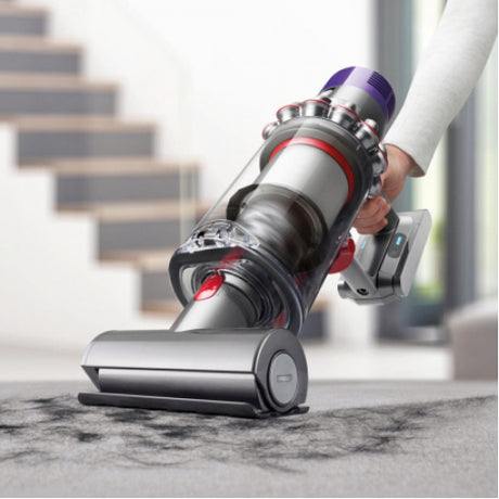 Dyson Cyclone V10 Absolute Cordless Vacuum Cleaner in Copper/Nickel, cleaning stairs