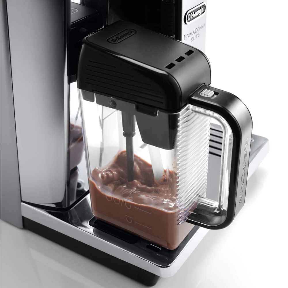 De'Longhi PrimaDonna Elite ECAM650.85.MS Bean-to-Cup Coffee Machine in Metal Silver, close-up of a chocolate drink being made