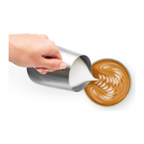 Sage Barista Express BES875UK Espresso Machine in Brushed Stainless Steel, pouring latte art