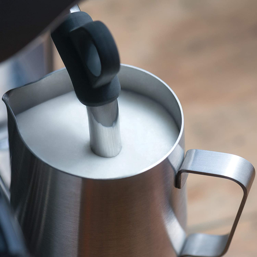 Sage Barista Touch SES880BSS Espresso Machine in Brushed Stainless Steel, frothing milk with the steam wand