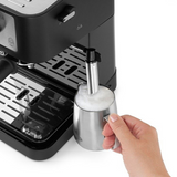 De'Longhi Stilosa EC260.BK Espresso Machine in Black, frothing milk