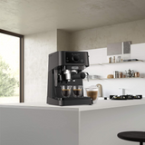De'Longhi Stilosa EC260.BK Espresso Machine in Black, in a room setting