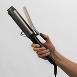 Remington Pro Big Curl CI5538 Curling Tong, held in the hand