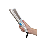 Remington Hydraluxe S8901 Hair Straightener, held in the hand