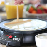 Russell Hobbs Fiesta 20920-56 Crepe Maker in Black, making a crepe