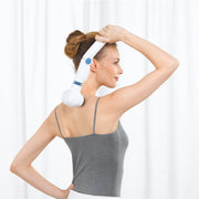 Beurer MG 40 handheld infrared massager in white featuring an adjustable handle, rotating head, and four interchangeable massage attachments.